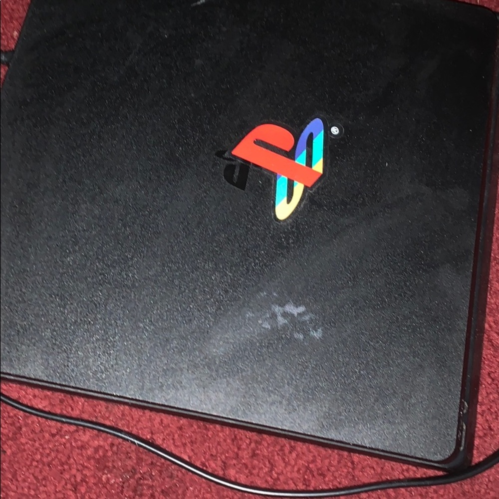 PlayStation 4 with controller and all games